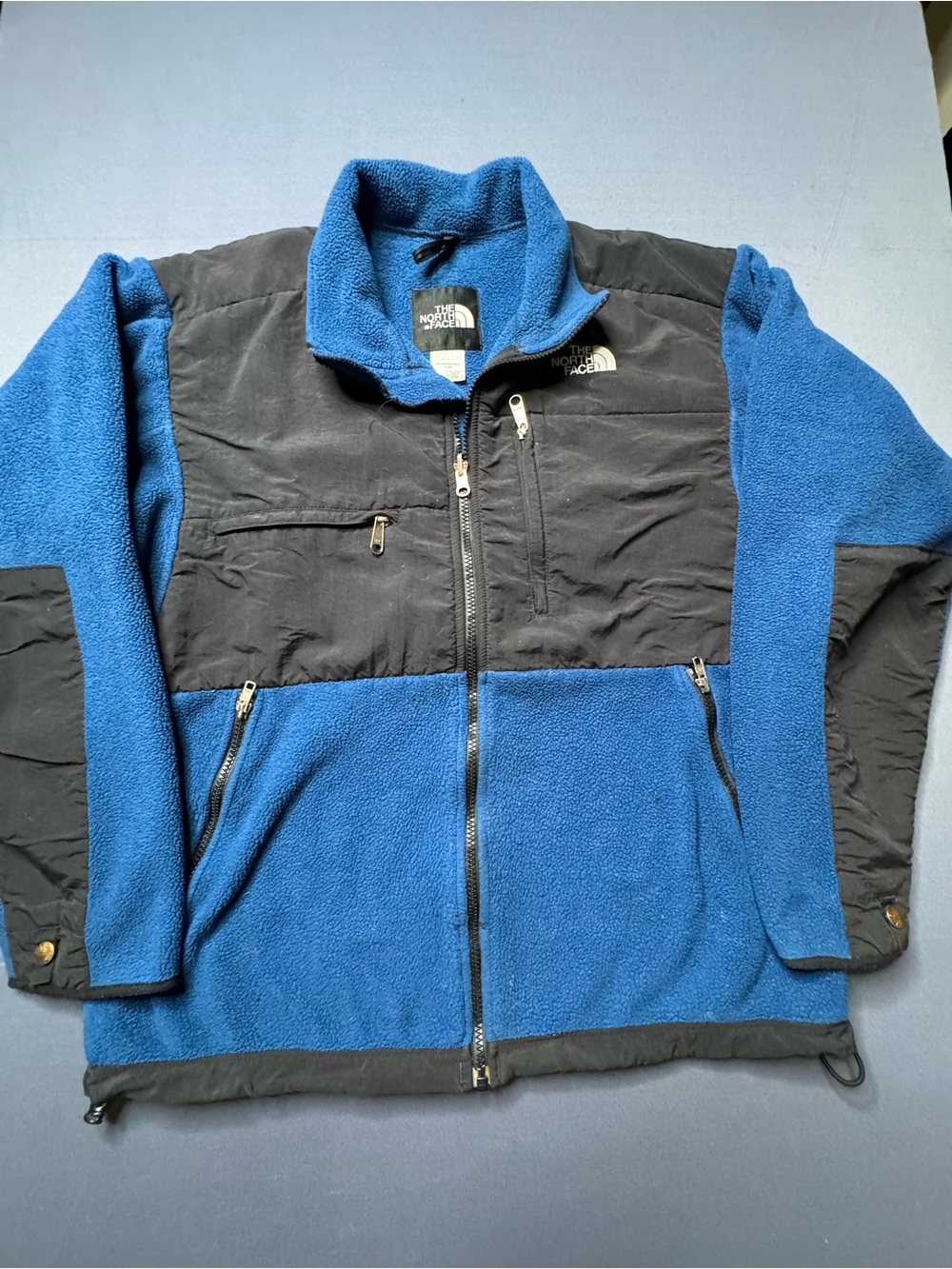 The North Face blue and black polyester fleece jacket in size M 1260